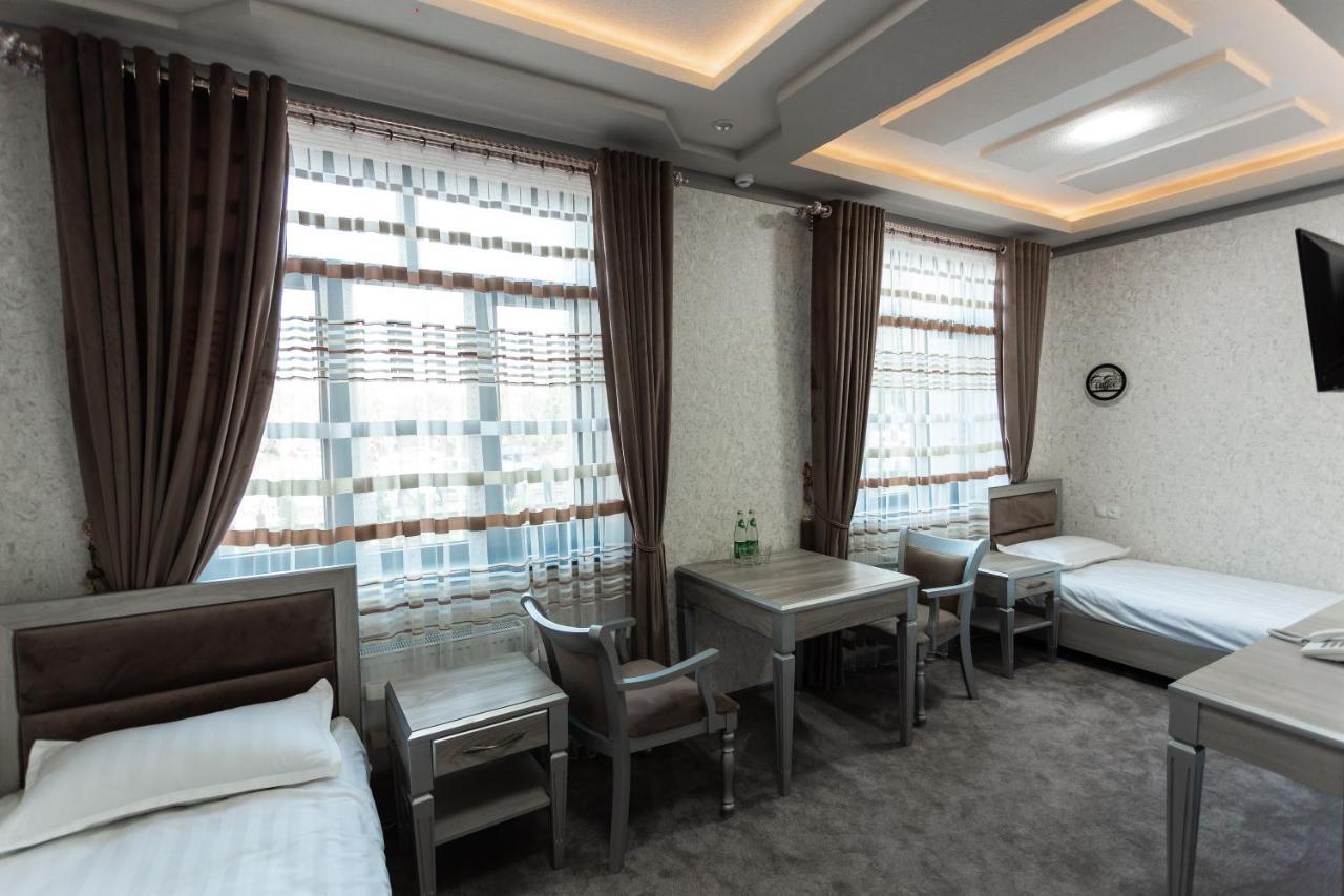 Diyor Hotel Marghilon Екстериор снимка