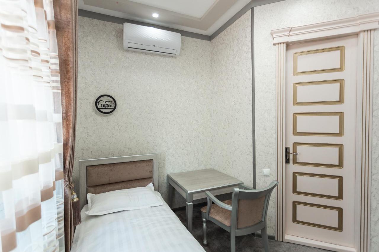 Diyor Hotel Marghilon Екстериор снимка