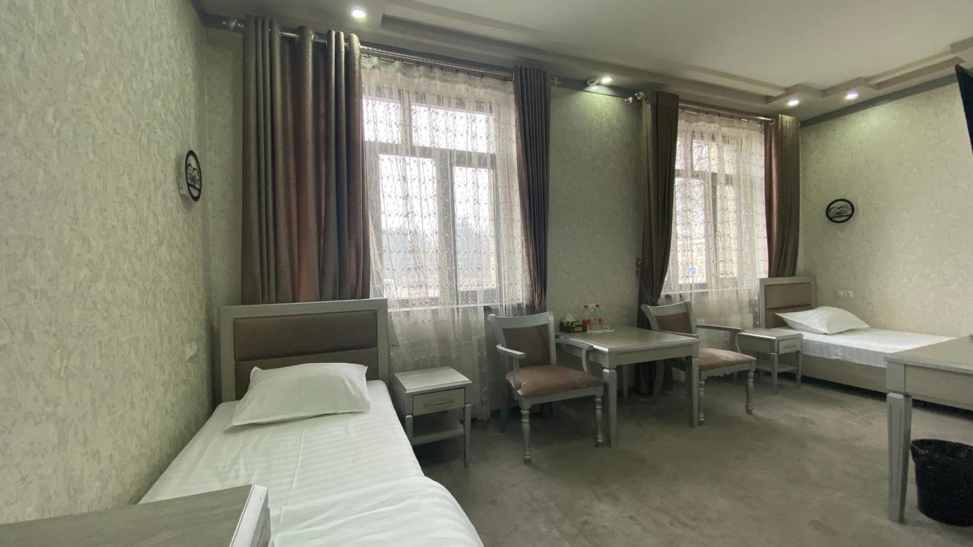 Diyor Hotel Marghilon Екстериор снимка