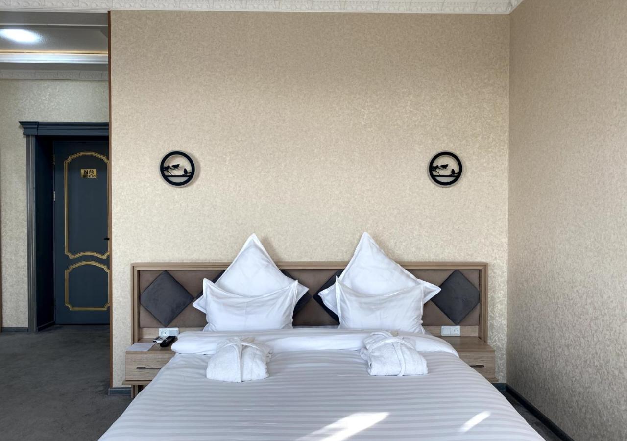 Diyor Hotel Marghilon Екстериор снимка